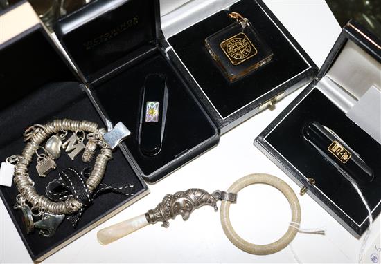 Links of London silver charm bracelet, Mr Punch babys rattle (a.f) & 2 Swiss penknives & a key fob (all inset small 24K ingots)